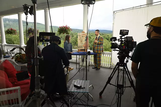 Nicholas Lowry appraises Howard Chandler Christy's "The Spirit of America" at Bretton Woods in New Hampshire. - KATHERINE NELSON HALL FOR WBGH