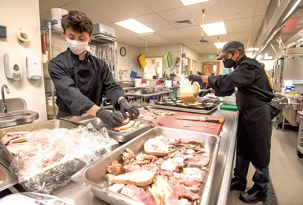 Victor Maldonado (left) and Pauly Falco working in the Culinary Kitchen Academy at Capstone Community Action in Barre - JEB WALLACE-BRODEUR