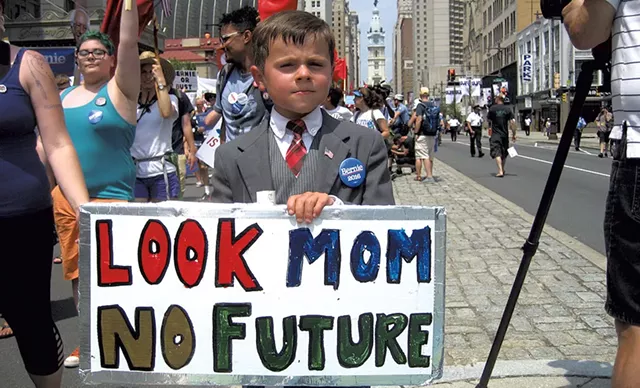 Connor Garrett, 9, of Hamden, Conn., marching in Philly - KEVIN J. KELLEY