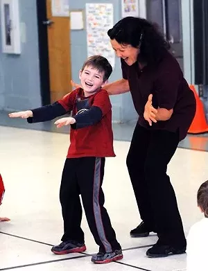 Karen Amirault with a student