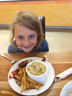 Mira with mac and chicken tenders.