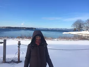 Jessica in front of Lake Champlain, adjusting to the cold