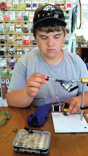 Tying flies at - Green Mountain - Troutfitters - SARAH YAHM