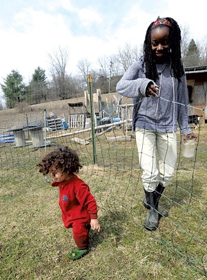 Daycare operator Marlena Tucker-Fishman and her son, Ezrah, in April 2014. - FILE PHOTO BY JEB WALLACE-BRODEUR