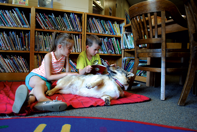 Luci and Jeffrey reading with Cora - DARCIE ABBENE