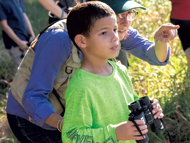 UVM lecturer Trish O’Kane and Flynn fifth grader Yadiel - KEN PICARD