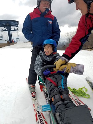 Garrett Richardson with instructor Andy Cook at Bolton Valley - COURTESY OF SMUGGLERS' NOTCH