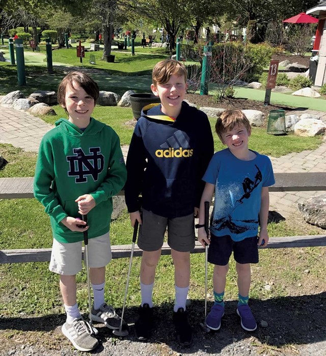 Miles, Felix and Leo get ready to golf - COURTESY OF BENJAMIN ROESCH