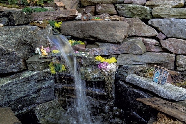 A waterfall graces the fairy garden Sawyer built for Mavis. - JAMES BUCK