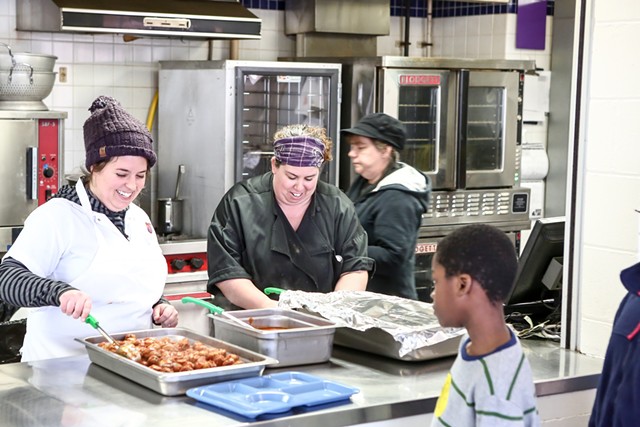 Chef Jaclyn Major of Butch + Babe's scoops meatballs in the IAA cafeteria - COURTESY OF BURLINGTON SCHOOL DISTRICT