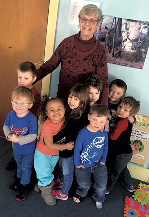 Judy Pransky, owner of Cherry Street PlayCare in St. Johnsbury, with children from the center - COURTESY OF JUDY PRANSKY