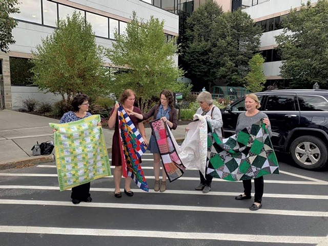 Joyce Irvine, right, with members of the Quilting Queens of National Life Group - COURTESY OF JOYCE IRVINE