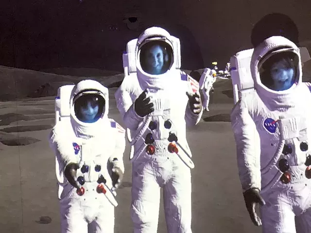 Max and family at a science center in Norway