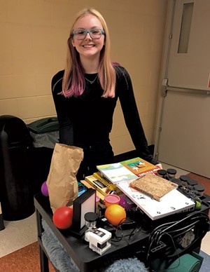 Champlain Valley Union High School junior Maddie Evans with a "stress-free" cart she designed for her Think Tank elective
