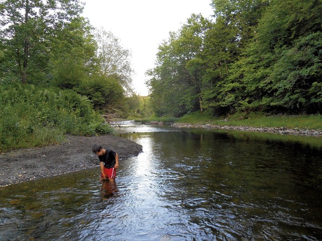 Heather's son Jesse wading in Qu&eacute;bec's Tomifobia River in 2014 - HEATHER FITZGERALD