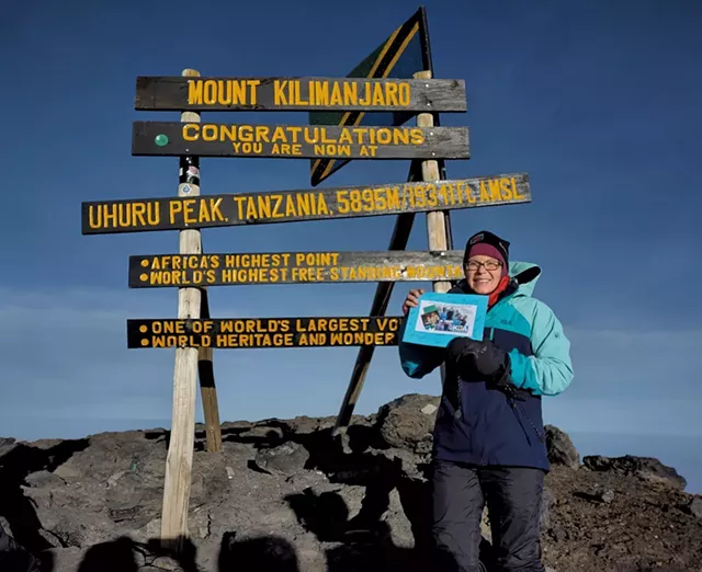 Rebekah Thomas atop Mount Kilimanjaro - COURTESY