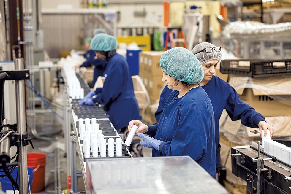 Workers at Twincraft Skincare in Essex - OLIVER PARINI