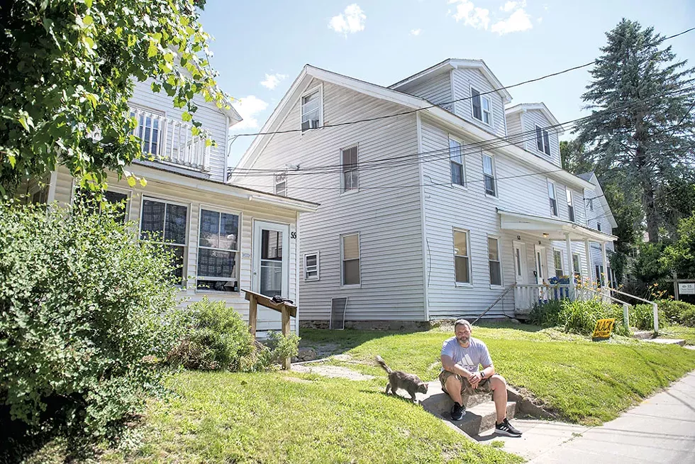 Caleb Breer in front of his Chase Street apartment in Burlington - DARIA BISHOP