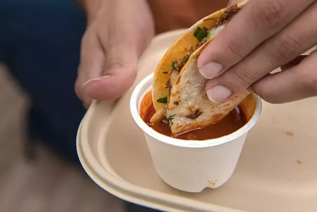 José Ureña showing how to eat birria - DARIA BISHOP