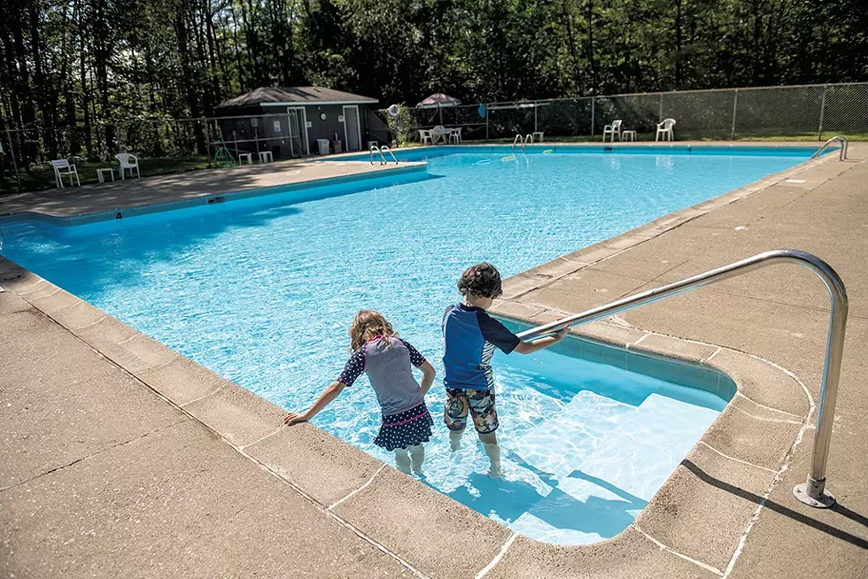 Kids playing in the pool at Westbury Park - DARIA BISHOP