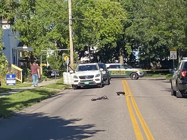 Footwear and other items on Manhattan Drive at the scene of a police shooting - FILE: MATTHEW ROY ©️ SEVEN DAYS