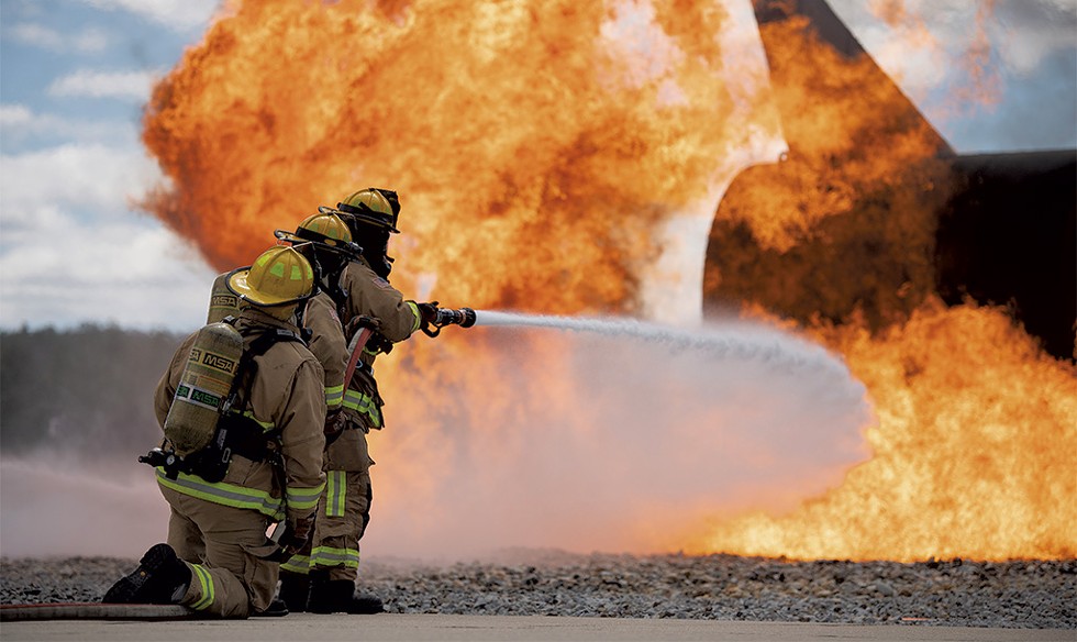Members of the fire department for the 158th Fighter Wing of Vermont Air National Guard participating in an annual live fire training in New Hampshire - COURTESY OF VTANG