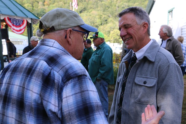 Gov. Phil Scott chats with supporter Laurence Jost - KEVIN MCCALLUM ©️ SEVEN DAYS