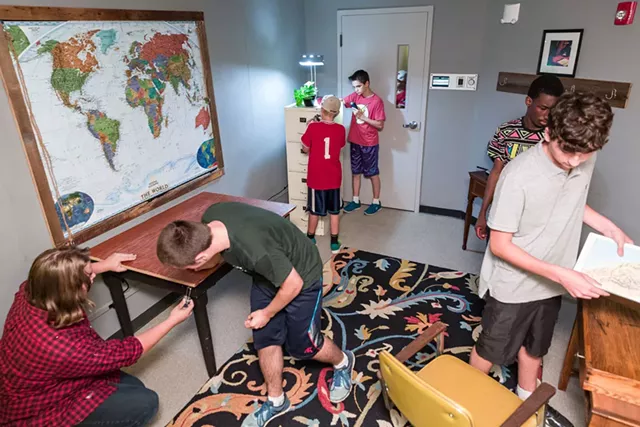 A group of students trying the Esc4pe room in Burlington - OLIVER PARINI