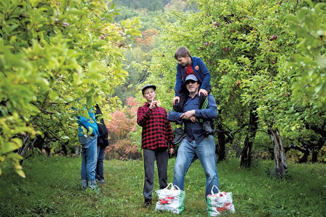 A family enjoying the orchard - COURTESY OF KELLY FLETCHER