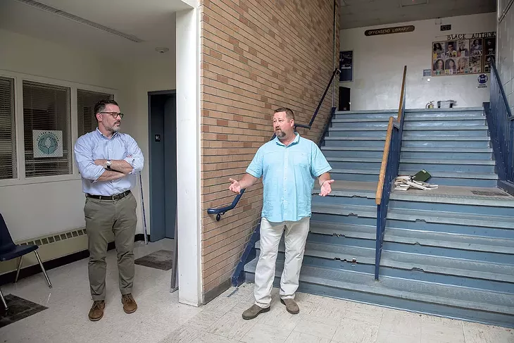 Superintendent Tom Flanagan (left) listening to Marty Spaulding of PCI Capital Project Consulting on a tour of BHS - DARIA BISHOP