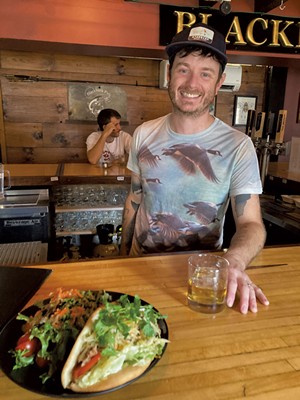 Bartender Tristan Baribeau at the Blackback Pub - SALLY POLLAK ©️ SEVEN DAYS