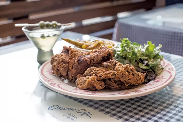 Martini and two-piece chicken dinner with greens and herbs and summer vegetable succotash at Onion City Chicken &amp; Oyster - LUKE AWTRY