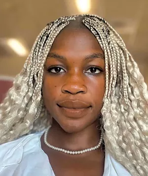 Dina John - COURTESY