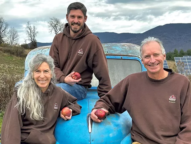 New Cold Hollow Cider Mill owner Dan Snyder (back) with former owners Gayle and Paul Brown - COURTESY