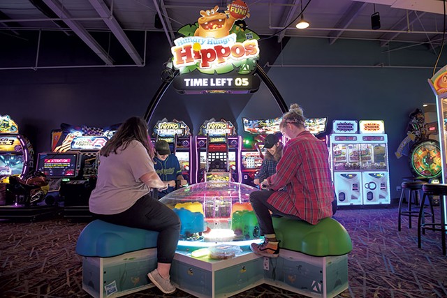 Clockwise from left: Jacey Rivers, Zachary Davis, Joe Wilcox and Leah Markt playing Hungry Hungry Hippos - DARIA BISHOP