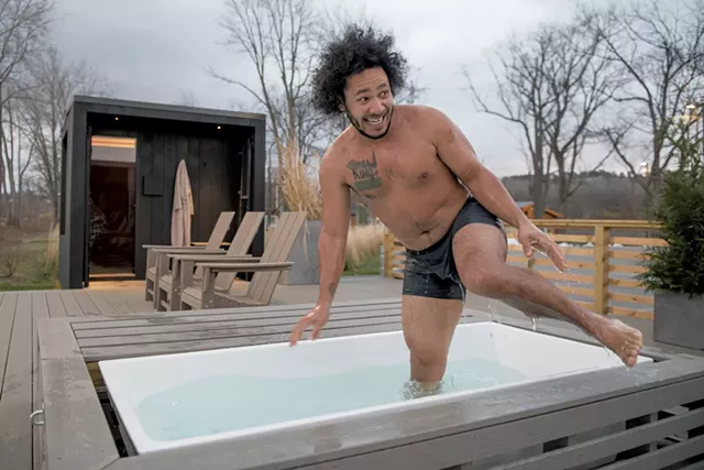Randy Camacho in the cold plunge pool at Savu's Burlington Surf Club location - DARIA BISHOP