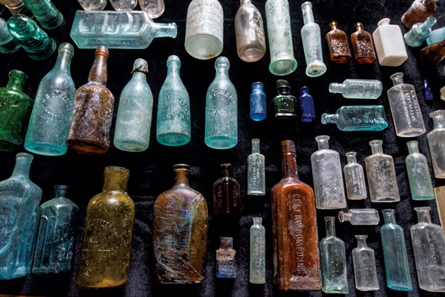 Some of the bottles from Laura Smith-Riva's collection - JEB WALLACE-BRODEUR