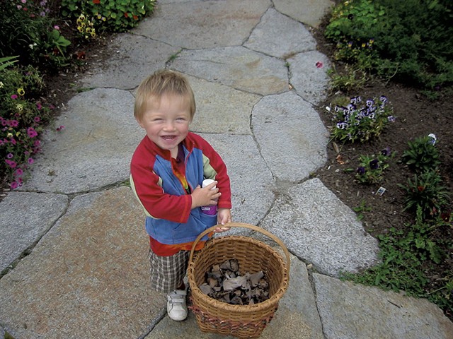 Mason Foard with a basket of black trumpet mushrooms in 2004 - COURTESY