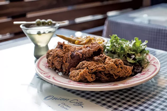 Martini and two-piece chicken dinner with greens and herbs and summer vegetable succotash at Onion City Chicken & Oyster - FILE: LUKE AWTRY