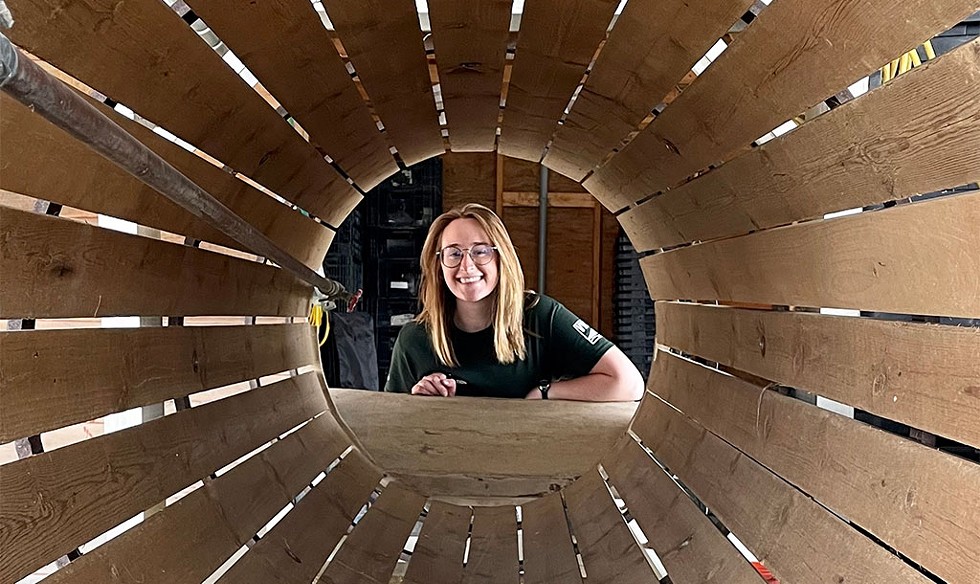 Ashley McGrann behind the root washer - COURTESY