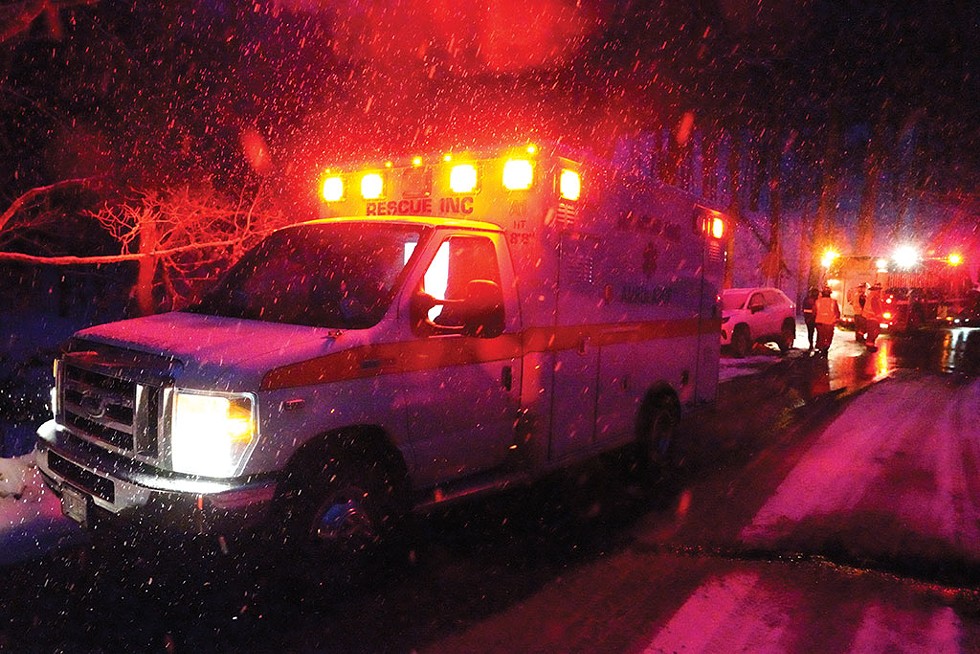 Rescue Inc. paramedics responding to a vehicle that slid off the road in Dummerston - DAVID SHAW