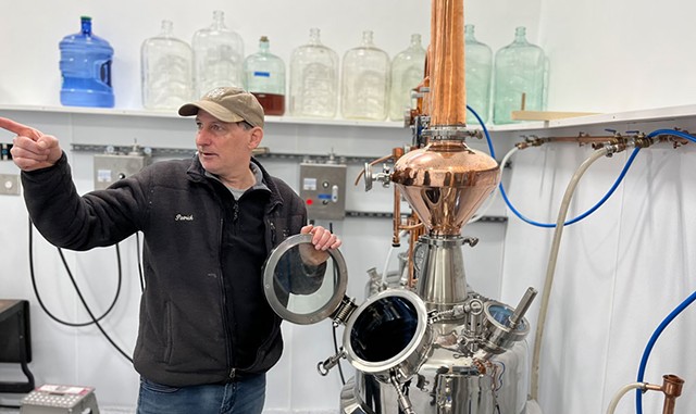 Patrick Barrelet with a still at Snow Farm Distillery - COURTESY