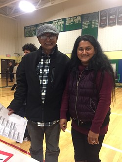 Kashi Ghimirey, 61, and his daughter, Rita Neopaney, 37, at Colchester High School - COURTESY PHOTO