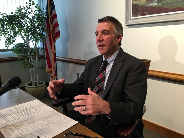 Gov. Phil Scott lays out the sale of his construction company. - JOHN WALTERS