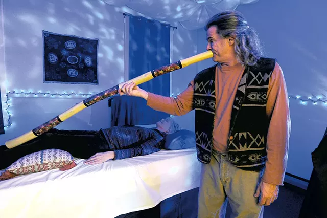 Pitz Quattrone giving vibroacoustic therapy treatment to Peggy Irons - JEB WALLACE-BRODEUR