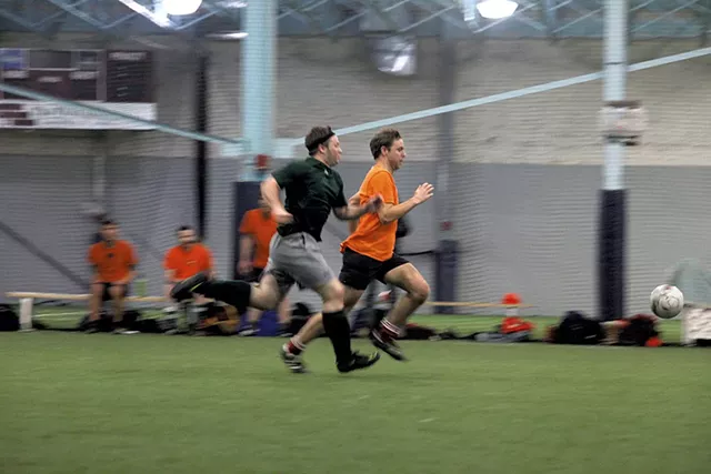 Tim Ashe (front) playing soccer last Thursday in Shelburne - MATTHEW THORSEN