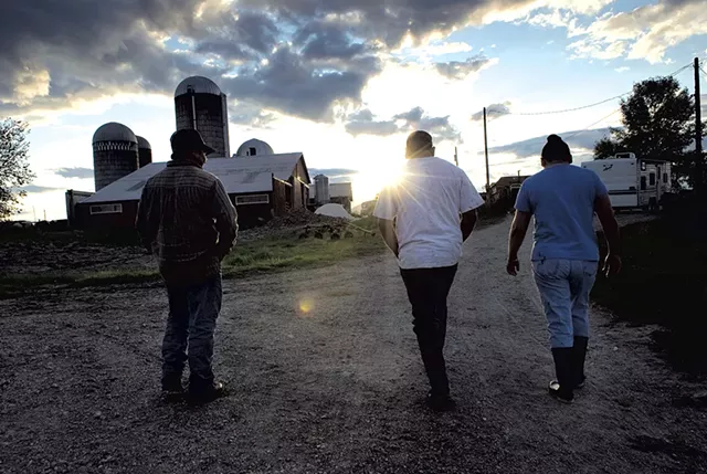 Migrant workers on a Vermont dairy farm - CALEB KENNA/THE GOLDEN CAGE PROJECT/VERMONT FOLKLIFE CENTER