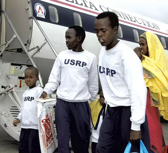 Haji, left, arriving in Vermont in 2003 - COURTESY OF THE BURLINGTON FREE PRESS