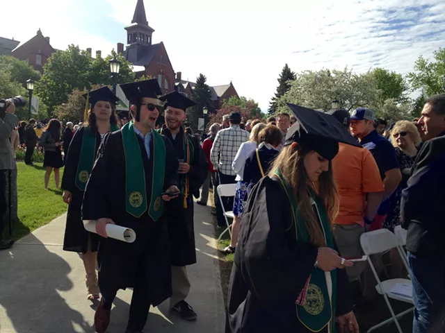 Students proceed to their seats. - MOLLY WALSH/SEVEN DAYS