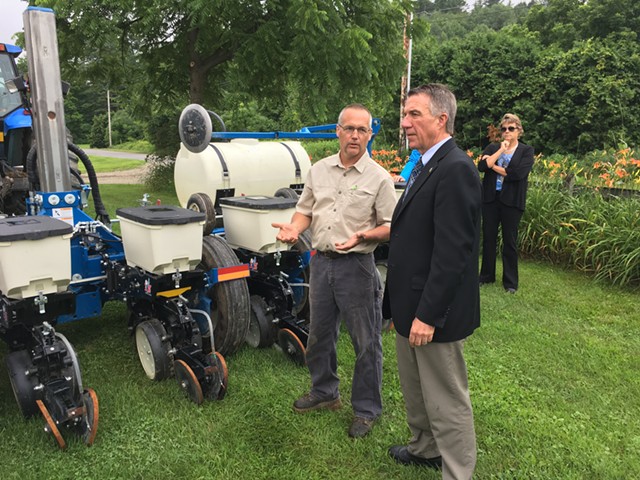 Lorenzo Whitcomb, owner of the North Williston Cattle Co., and Gov. Phil Scott - JOHN WALTERS